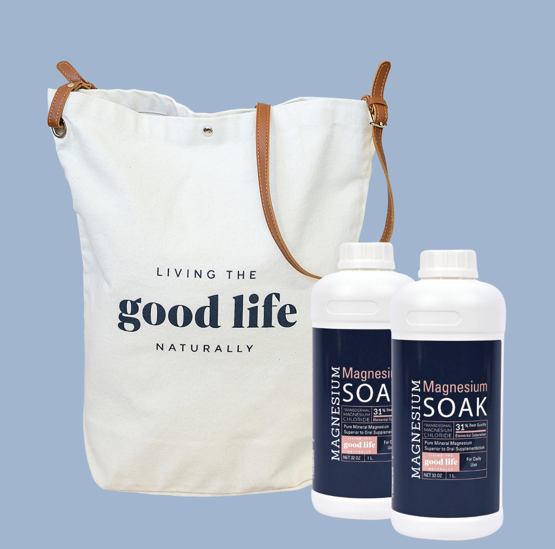 Two bottles of Magnesium Soak for Stress & Anxiety Relief and a white tote bag with 'LIVING THE GOOD LIFE NATURALLY' printed on it