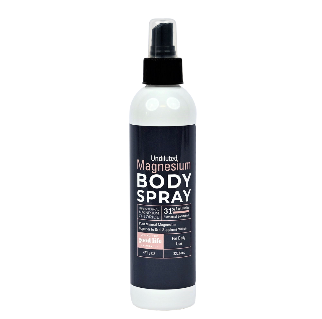 A white bottle with a black spray pump and clear cap featuring a blue label. The label reads "Undiluted Magnesium Body Spray, Transdermal Magnesium Chloride, 31% Best Quality Elemental Saturation, Pure Mineral Magnesium Superior to Oral Supplementation, For daily use, Net 8 OZ / 236.6 mL" with the Living the Good Life Naturally logo on a pink background.