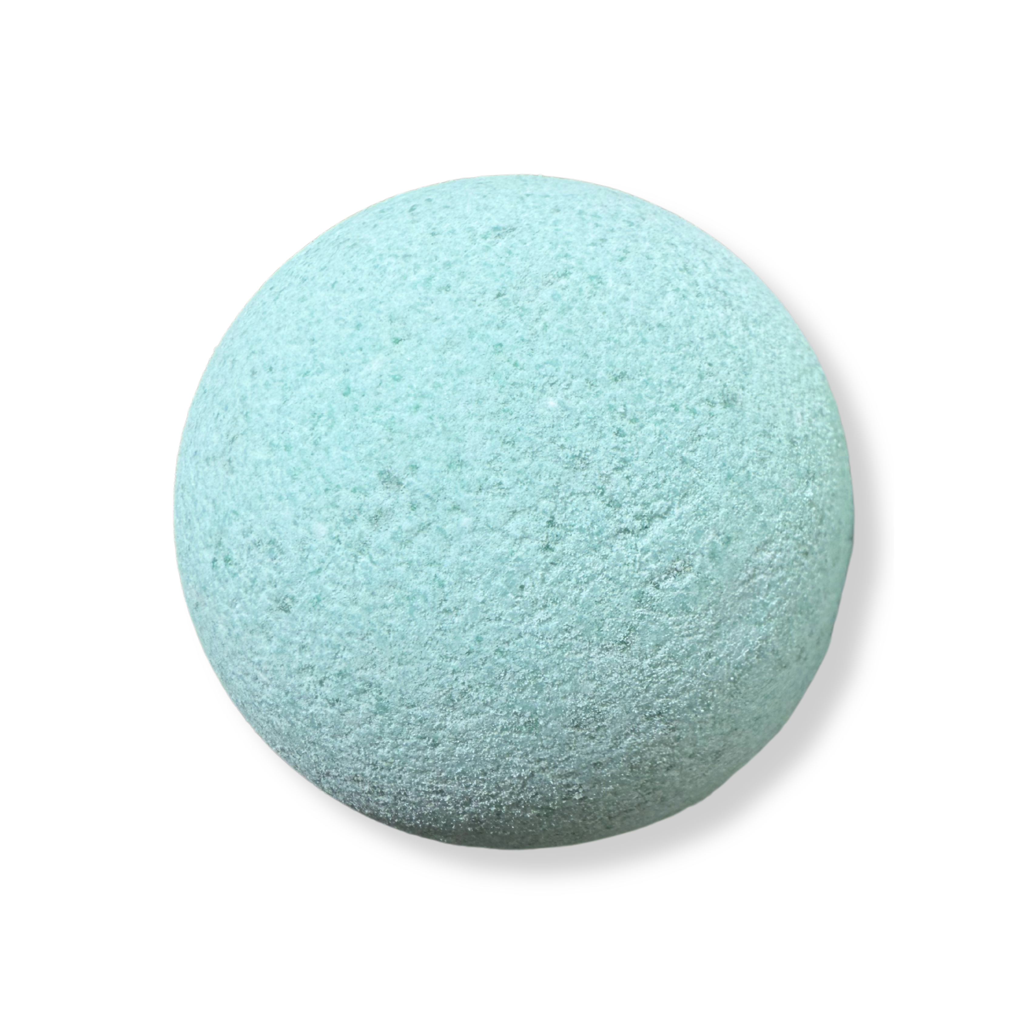 A blue bath bomb on a white background, with a textured surface by living the good life naturally