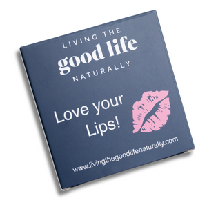 A rectangular box with a navy background, featuring the text 'Living the Good Life Naturally' and 'LOVE YOUR LIPS!' along with the website address 'www.livingthegoodlifenaturally.